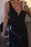 Dress is true navy color. Neckline is a little low if you have a bigger bust, and I thought I would be able to sew it shut but there is wire so unable to do this- something to consider for those with bigger bust. However, still a beautiful and can wear a bra with it which is a bonus. - Tina G.