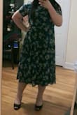 It's flattering. Like the color and the pattern. It looks better in person than the pictures. 
What I like about this is I can coordinate any kind of style because it goes well with anything. I can dress up with heels for formal occasions but it can be also casual look with sneakers or a denim jacket. - Su Y.