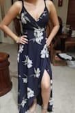 I love this dress. I bought it for my daughter to wear to a Havana Nights party and it was perfect. She wasn't completely sold at first but loved it once she saw the pics. It is very well made and the color and fabric were perfect. It photographs really well and looked stunning. It runs small, I bought her an XS and it fit perfectly however she is very petite. - Celinda P.