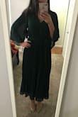 I liked this dress. It fit long but I liked how long it was. The back is sheer. Not sure how I feel on the sleeves but really cute. - Ariana B.
