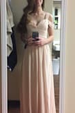 Love the way the dress looked! Just a little big in the bust, but fit perfectly in the waist and hips. The straps on the shoulder are restricting (the bottom strap) but if you're not a crazy dancer - go for it! - Madeline L.