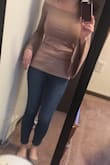 If your body is toned nicely go for it! I usually order size S but after reading reviews I ordered a medium. Glad I did, it wasn't skin tight, but still fit perfectly. However, the top will show those imperfections of any belly flab. Cute top but I returned. - Julie B.
