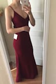 I decided to get the extra small, even though I usually wear a size small in other brands, and it fit like a glove! The material is thick and has a bit of a stretch to it. It's super comfortable too! I found that I did not need a bra with this dress, although it pulls a little low while sitting. The skirt was a little wrinkled when I took it out of the package, but it straightened out after being hung up for a few days. I had no need to iron it! - Samantha W.