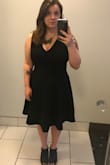 I wore this dress to my cousin's wedding in North Carolina. The fabric was thicker than I thought it would be but felt nice on. I did have the skirt hemmed up a little cause it was just a couple inches longer than I wanted but otherwise it was absolutely perfect! It gave me a nice waist line, was a little cleavage but not too much and I felt really great in it. - Leanna B.