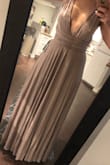 Before ordering, I consulted with a live chat agent who was able to help me confirm my size in the dress; it fits perfectly. The dress itself is so comfortable, and it is a lot of fun trying out new styles with the interchangeability! I ordered this as a bridesmaids dress and will be able to wear it for many other occasions! - Lucia H.