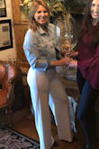 I did have to get it taken up a tad, but the fit was great and wasn't see through like most white jumpsuits. - Taylor H.
