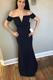 I got this dress for a bridesmaids dress. It's comfy and fits perfect. I ordered a small at first, but exchanged for an xs and it's perfect. I am short, so I do need to get it hemmed. The dark navy is beautiful and looks great on all bridesmaids. - Danielle W.