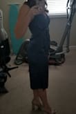 This dress is very nice. It fits well in the top and is a good midi length. It is tight in the hip area. If you are a pear shape I would not recommend. - Jenelle P.