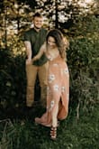 I wore this dress for my engagement pictures and I loved it! Fit super well, material was thick enough to get away without wearing a bra. The high low was nice because I didn't need to get the dress hemmed. I wore some tall wedges with it and it was perfect! - Dana L.