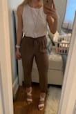 The medium fit perfectly. Super comfy pants and super versatile. Can be dressed up (I'm wearing to my brothers engagement party) or dressed down. Love! - Cara D.