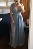 Love this dress! The color is stunning and the slit falls at the perfect spot. I'm pretty short so it needs hemming but aside from that it fits perfectly! Wearing this dress to prom and I can't wait! - Emily H.