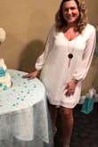Whenever I buy a shift dress I'm always worried about it looking boxy but this wasn't at all. I did mark true to size but please note I typically wear size large and I purchased medium because of the style. It was very flattering and fit perfect. - Tina N.