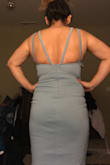 Very nice dress. It has thick material. The straps were a little bit long for me, but that was an easy fix. Try to wear the right underwear for this dress. As you can see I was just trying this dress on but will not wear a bra with it. - Isela V.