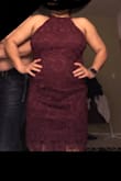 Love this dress. The material is really nice and thick, but it has no stretch at all. If you are a small I will recommend to order a medium. It runs a little small by the rib area, not the waistline.. - Isela V.