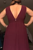 I love, love this dress! The material is really good, so the dress is super comfortable!! I usually wear size small if the material is stretchy or has some stretch. This one I got in a medium after reading the reviews and I am glad I did. The material doesn't have any stretch. - Isela V.
