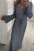 Love this!!! Very light feeling when it's on. For being a maxi and long sleeve, you could easily wear in the summer cause it's just so light. Fabric is great. It's a little bit long, though with wedges or a little heel it would be perfect. Definitely recommend. - Renee B.