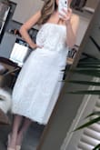 Very cute and flattering dress for summertime. Could see it being worn for bridal events or even an outdoor, bohemian style wedding. May need to order smaller for the top portion, as it's a bit loose. The lace is thicker feeling and beautiful in person. Looks expensive! - Rachel H.