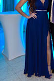 I love, it looks so elegant, I wore it to a wedding. It is long, I had 4inch heels and it touched the floor. - Yordana C.