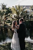 I ordered a size small and it fit perfectly according to my measurements and the size chart. This dress has a slightly pink undertone but nothing too crazy and fit the rustic theme for my wedding perfectly. I wore a trumpet silhouette slip underneath and it gave the dress a perfect amount of flare at the bottom. It's definitely a little see through without a slip so get one if you can. The lace detail over the top was beautiful. The dress got so many compliments and I am so pleased with it! I am absolutely in love with it. - Sara W.