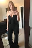 This is the cutest jumpsuit ever. I have been looking for a black jumpsuit and this is perfect. I haven't gotten to wear it yet, but I bought it just to have. I can't wait to wear it. Pants are definitely too long but most things I have to hem anyways. Also very flattering on!! - Hanna F.