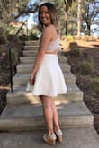 I love this dress so much. I needed a white dress for my sorority, and I fell in love with this one. It is so flattering, comfortable, and the back is adorable. I would highly recommend! - Paulina B.