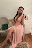It fit well and true to size! Looks flattering on many different body types. Loved it! I didn't have to hem it and I'm 5' 7". I wore heels with it. - Allison J.