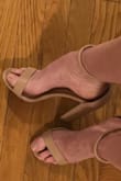 The shoe itself looks cheaper then some cheap shoes I buy at the same price. The ankle piece is meant to slide over your toes and stretch up and over your heel to be at your ankle. There's no support with it and felt my heel was sliding out left or right. 
I'm typically a size 6.5-7 and i ordered a 6.5 and there was too much space in the heel. 
If someone is looking at them from far away, they aren't bad. But look too cheap in my opinion and aren't comfortable. - Sydney R.