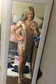 I ended up returning this dress and not wearing it out because it was heavier than I expected and not flattering on me. It looks light and flowy on the model but in reality it hangs straight down and I also couldn't find shoes that matched it. (Hence two different shoes on my feet haha) It kind of looks like it has some shape in the picture, but that is just because my hand is pulling it in. I felt like a square :(

I usually wear a small so I ordered both a S and XS because I had a feeling it would be long. Even the XS was bigger than I wanted it to be. It felt like a bedazzled T-shirt.

Not a bad dress, I just had better options. The sequins were also itchy under my arms.

The gold color is very pretty! - Brennan C.