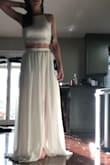 I'm getting married on the beach in Aruba and this dress could not have been more perfect. I needed something easy on my budget (destination weddings are expensive), but that still looked nice and beachy. This dress fit the bill perfectly. The only downside is that I'm going to have to have it altered as it's a few inches too long, but I'm 5'3, so that's to be expected with any dress. I would highly recommend this dress to anyone. You won't regret it. - Brittany S.