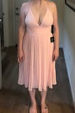 Love it! Fit perfectly and doesn't look too revealing even for us bustier gals, even held the girls up without a bra lol - Kaylon H.