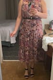 At first, I was unsure because i felt like it looked like my grandma's curtains. I would definitely pair it with a black belt or something similar to add a little something something to it. However, I got many compliments and it was perfect for the occasion. - Courtney B.