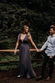I love this dress so much! It was perfect for our engagement pictures and flowed awesome in the wind! On me the sleeves seemed a bit too loose and I had to secure them with some fabric tape, but that's my only complaint. On the size chart it said that i would be an XL but after reading the reviews I decided to size down, and I'm glad I did! The quality on this dress is awesome, and I'm so excited to wear it to other events. - Talia P.
