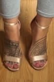These shoes are incredible. I purchased them for my outdoor wedding. They are gorgeous in person and are just as pictured. However, you should 100% order a size down. I am a 8.5-9 and I got an 8, they fit perfectly. I am very thankful I read the reviews and sized down. They are quite sturdy and not terribly uncomfortable. I quickly purchased a second pair because what a great price! - Mariah D.