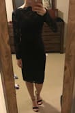 I normally wear size small in tops and dresses but this dress was too loose on me in a size small. Instead of hugging all my curves, this dress just flattened everything out into a bland black look. If you're looking for a very modest dress, this would be it. I returned it because it's not as flattering on my body type as I had hoped. - Yelena S.
