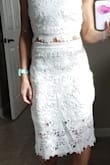 I loved this dress and so did my fiance but the floral overlay material was too pooch-y for me so I sent it back. It didn't sit smooth over the body like it does on the model. Maybe part of it was that it was fresh out of the shipping package? - Gabrielle P.