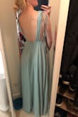 I am tall, and it's so nice that this dress has length!!! It's perfect for my friend's wedding. Light and flowy with unique details! Runs a bit large in the chest... usually I am a medium, but I went with the small for this reason. - Sam D.