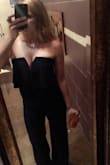 Fits great. And it's very flattering. Might be uncomfortable for bustier ladies but looks great with a good strapless bra you won't have to keep tugging at it to pull it up like so many other strapless clothes. Loved wearing this to weddings/special events. - Emily G.