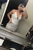 Ordered an L due to reviews stating the dress ran small and the material wasn't stretchy. Fair to say I should've gone with my gut and ordered an M to start with! The L did not fit. I returned it and ordered an M which fits perfect! Can not wait to wear this dress for my bachelorette weekend! Order your true size!! Below is a picture of the L on me. - Cinthya T.