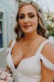 I wore this dress to my wedding ceremony on the beach and it was perfect for the setting. Everyone loved it and couldn't believe how little I paid for it! The only alteration needed was to shorten it a few inches. - Megan F.