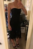 I loved the style of this dress online and even more so in person, but the top was so tight I could even get it to zip up without a bra. I'm only a 32B so a snug fit in the chest is not normally a problem for me and I always wear XS in Lulus. I would definitely size up on this one. - Nicole M.