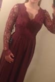 Ordered as a bridesmaid dress, arms are loose and able to fit muscular arms without looking funny. The back gapes a bit when arms are down. Way too long, will need to get it hemmed even if wearing heels. Pretty colour, true to pictures online. - Monique V.