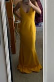 I ordered this dress for my prom but unfortunately it didn't fit. It's a really nice and simple dress and I love the color! However, it was a little big on me so I would need to get an xs. Overall, a really nice quality dress for the price. - Michelle R.
