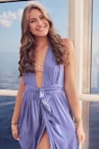 Love the dress, I got so many compliments on the color and the style both on my Instagram pictures and in person! Definitely recommend! The material does wrinkle easy so make sure it is always hung up on a hanger....however it's very easy to iron as well. - Erica
