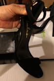This is a must have petite, black heel to pair with your little black dress. It's a very high heel & does take some breaking in, but a VERY cute shoe! Bought two! - Jocelyn O.