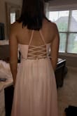 His dress is lovely. My daughter loves the back and the touch of sparkle at the waist. - Stephanie K.
