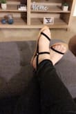 These sandals are really nice - simple, thin, delicate looking, and kind of minimalist which is exactly what I was looking for. 
I'm generally a 5.5 and "sometimes" a 6, with these sandals there's absolutely no sole around my foot, so the fit is almost too exact, it kind of fits me like a size 5 would... the little issue I have with that is the fact that I have chubby/wide feet, so I wonder if a size 6 would have a little wider front strap... when I first tried them on, they felt tight and looked weird-ish (well my toes did) however after walking around the house with them on for about an hour, I feel like they have loosen up a bit so I'm hoping that when I start wearing them out they'll feel just perfect, as it happens with almost every shoe after some time. They are really pretty. The perfect summer sandals!! - Natalia D.