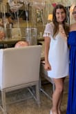 I wore this for my bridal shower and had so many compliments. Very comfortable. I'm normally a small so that's what I ordered- it was a good fit. It was not skin tight my any means but not too baggy. I considered an xs but was concerned about the length. - Lydia K.