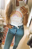 Love this t shirt! It's really soft and comfy. I love love the bright colors! It is a little bit more baggy than I thought it would be, but I like to tuck in or tie my t shirts anyway so it's perfect for me! It looks cute with jeans and skirts! - Erin W.