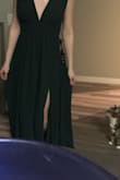 I absolutely love this dress! I'm 5'8" so most dresses are too short for me but this one perfectly hits the ground. I won't need any alterations. There's grips on the straps to prevent it from falling. It's a little tight on my ribcage so I'll need help zipping it but other than that I'm obsessed with this dress! Also the slit really only shows if you stick your leg out! - Delaney S.