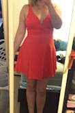 This dress is so fun and flirty! The material is a nice weight and it's very stretchy. I have a full bust, but I feel secure without an extra layer.  
Highly recommend if you need a party dress! - Ana P.